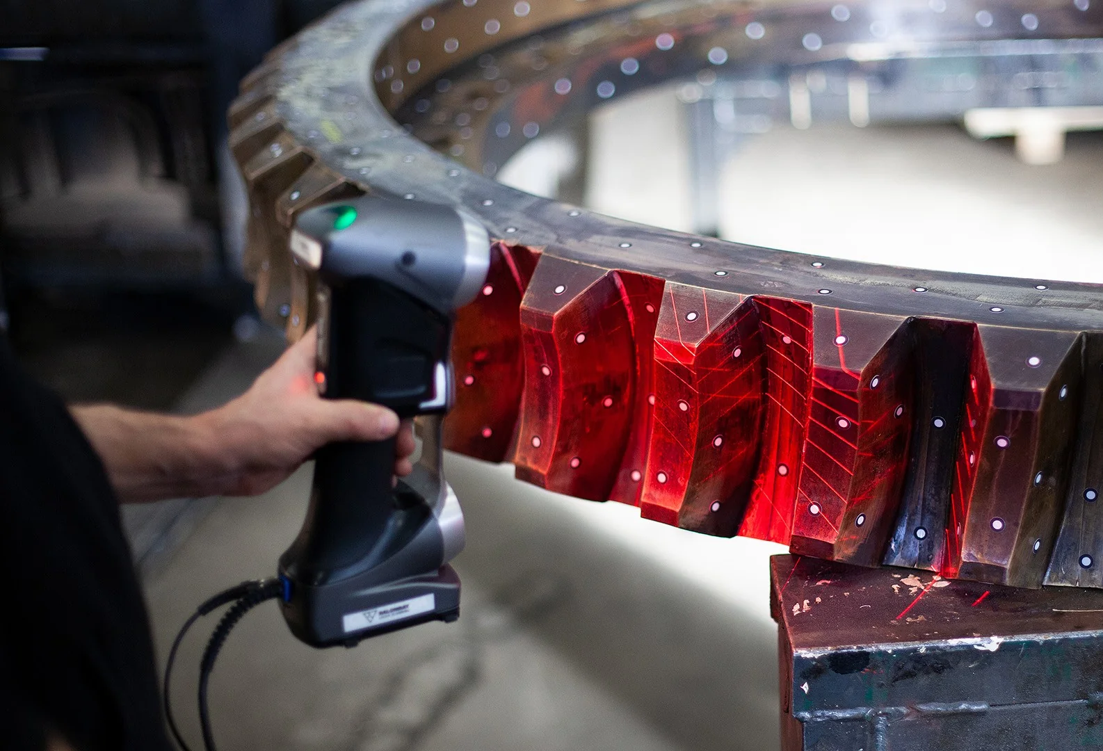 Laser scanner capturing surface data from a precision machined gear